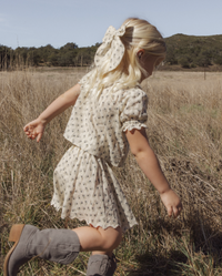 Vintage Fleur Smocked V Mini Skirt