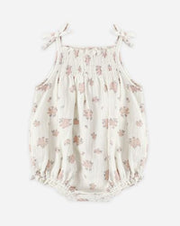 Floral baby romper on a white background