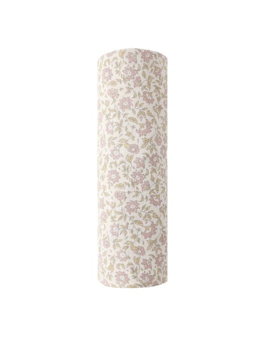Floral-patterned cylindrical object on a white background