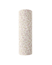 Floral-patterned cylindrical object on a white background