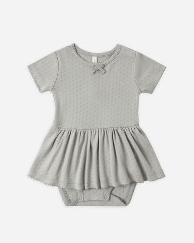 Gray baby dress with a matching bloomers set on a white background