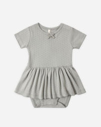 Gray baby dress with a matching bloomers set on a white background