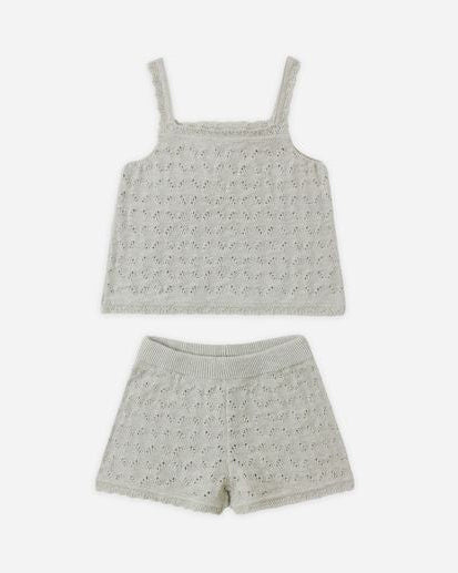 Children's set with top and shorts on a white background