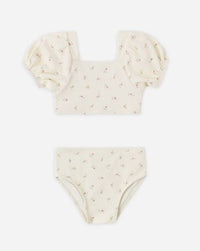 Two-piece swimsuit with puff sleeves on a white background