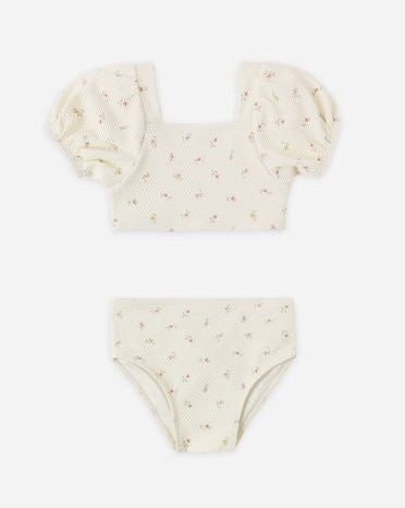 Two-piece swimsuit with puff sleeves on a white background