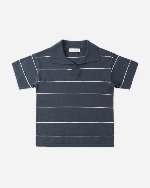 Navy striped polo shirt on a light gray background