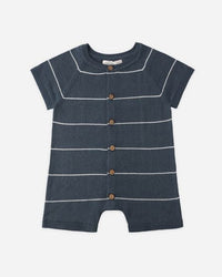 Navy blue romper with white stripes on a white background