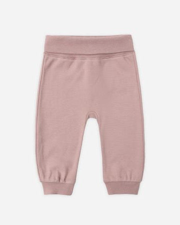 Pink baby pants on a white background