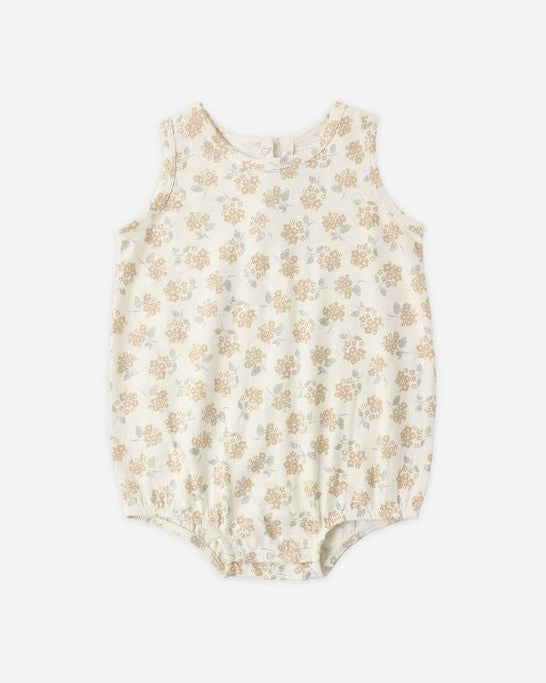 Baby romper with floral pattern on a white background