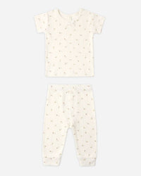 Baby onesie with a subtle pattern on a white background