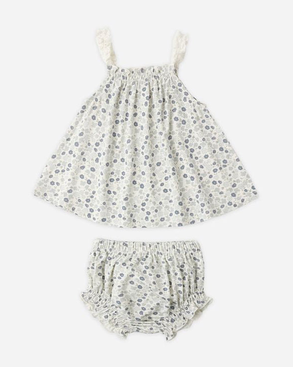 Floral dress and bloomers set on a white background
