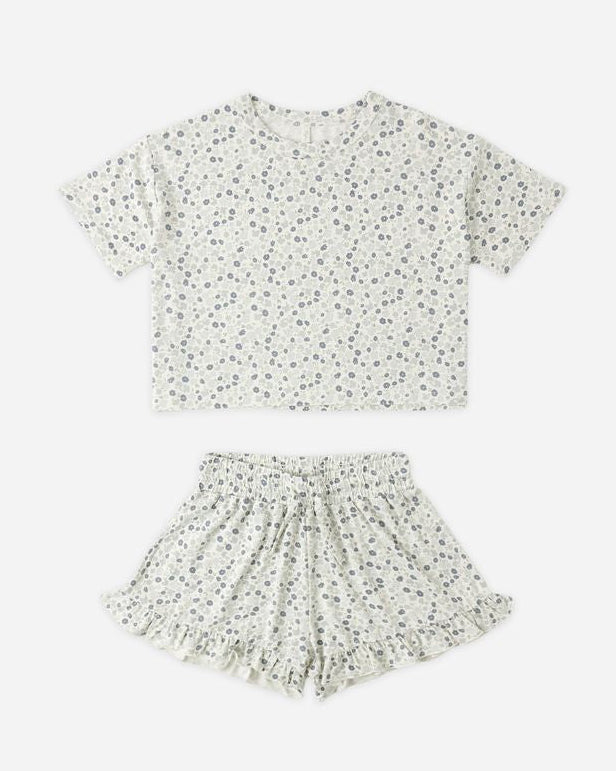 Floral patterned top and skirt set on a white background