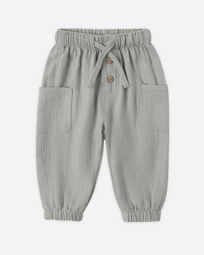 Light gray children's pants with a drawstring on a white background