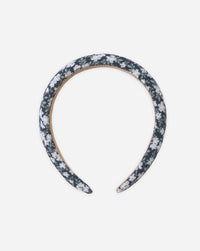 Floral patterned headband on a white background