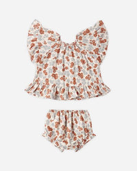 Floral baby outfit with top and bloomers on a white background