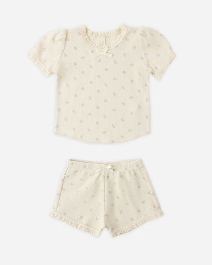Children's outfit with a shirt and shorts on a white background