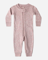 Pink baby onesie with star pattern on a white background