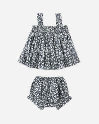 Floral dress and bloomers set on a white background