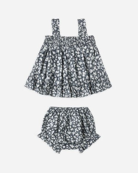 Floral dress and bloomers set on a white background