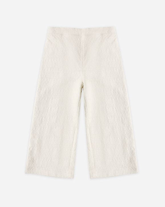 White pants on a white background