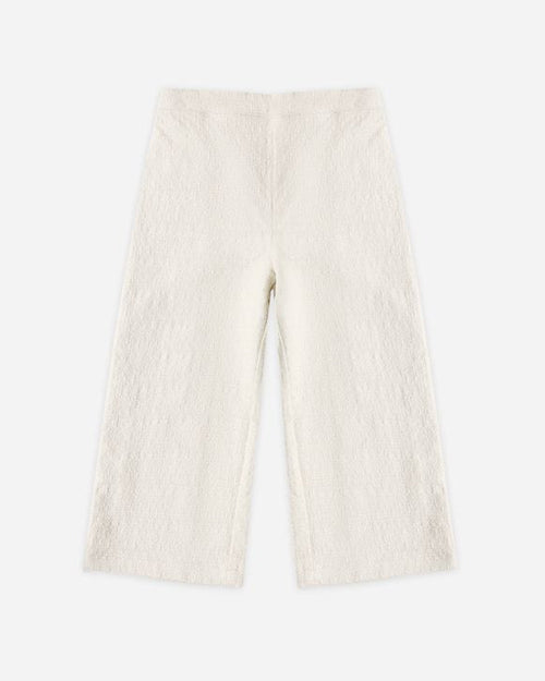 White pants on a white background