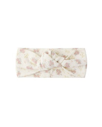 Floral patterned headband on a white background