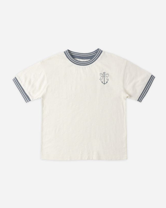 White t-shirt with black anchor design on a white background
