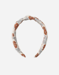 Headband with floral pattern on a white background