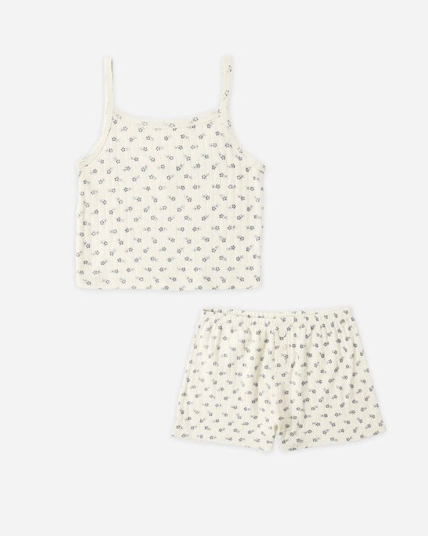 Set of polka dot top and shorts on a white background