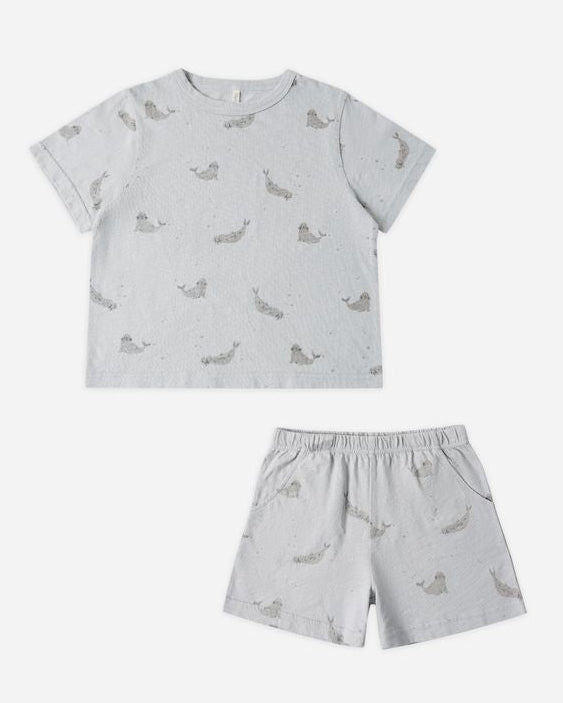 Children's set with a patterned t-shirt and shorts on a white background