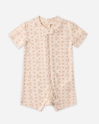 Baby romper with short sleeves and a zipper on a white background