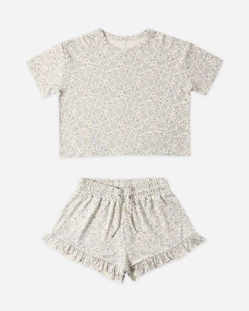 Children's outfit with t-shirt and shorts on a white background