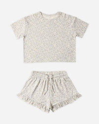 Children's outfit with t-shirt and shorts on a white background