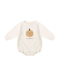 Baby romper with pumpkin design and text on a white background