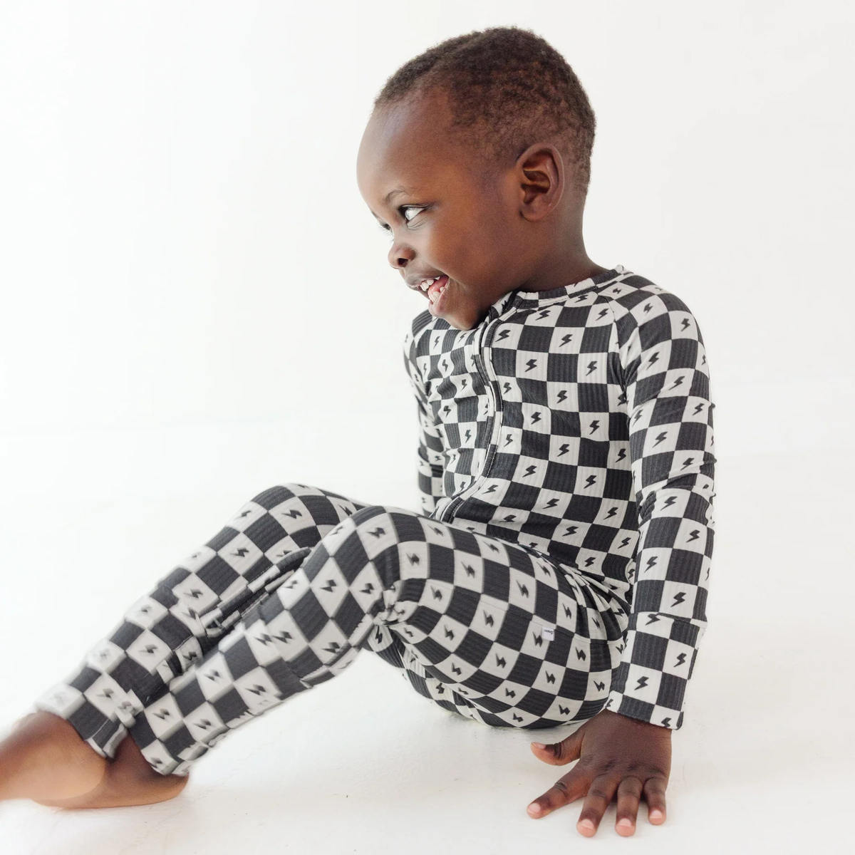 Checkered Lightning Bolt Small Ribbed Zip Romper