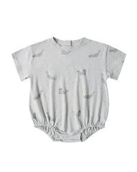 Gray baby romper with seal pattern on a white background