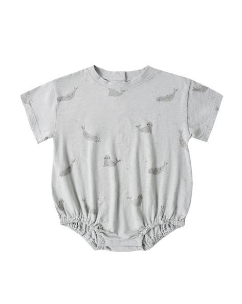 Gray baby romper with seal pattern on a white background