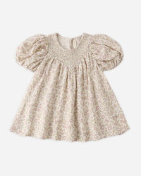 Beige floral dress with puff sleeves on a white background