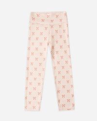 Leggings with a bow pattern on a white background