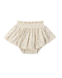 Beige baby bloomers on a white background