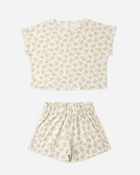 Floral patterned top and shorts set on a white background