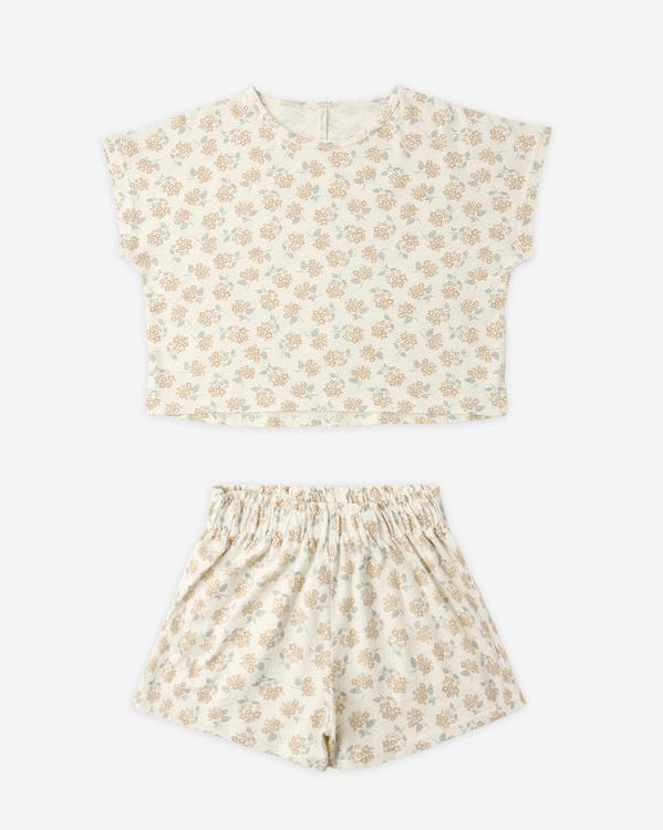 Floral patterned top and shorts set on a white background