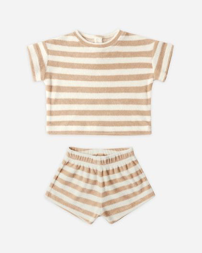 Striped children's outfit with t-shirt and shorts on a white background